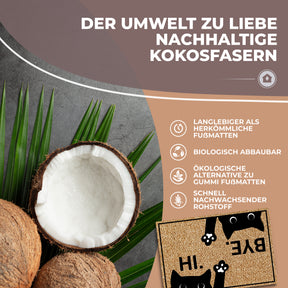 Kokosnüsse und Palmblätter veranschaulichen die nachhaltigen Fasern der ElbFuchs Fußmatte mit schwarzem Katzenmotiv und der Aufschrift 'HI.' und 'BYE.'.